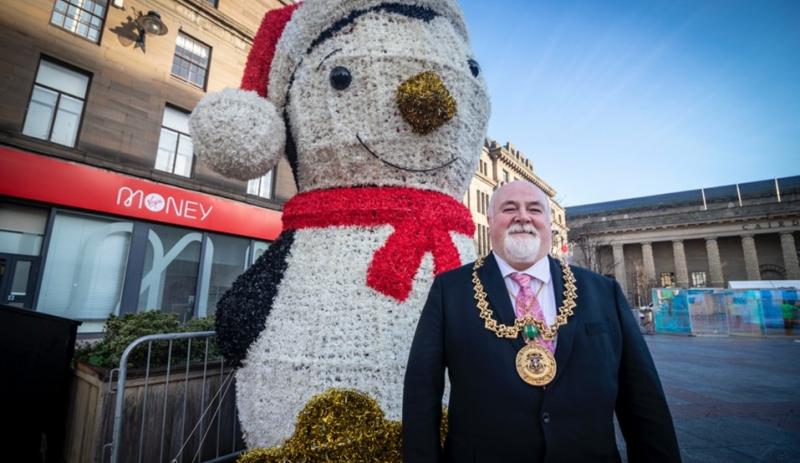 The Lord Provost in City Square with giant penguin in background