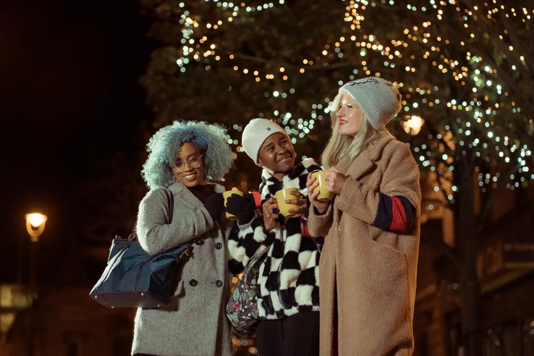 Stylish women outside at winter